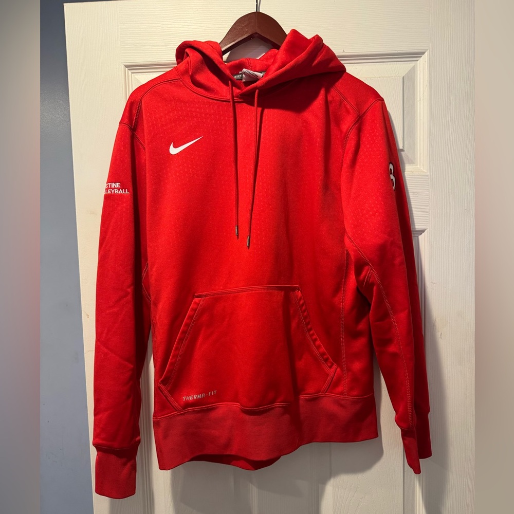 Red Nike thermafit hoodie.